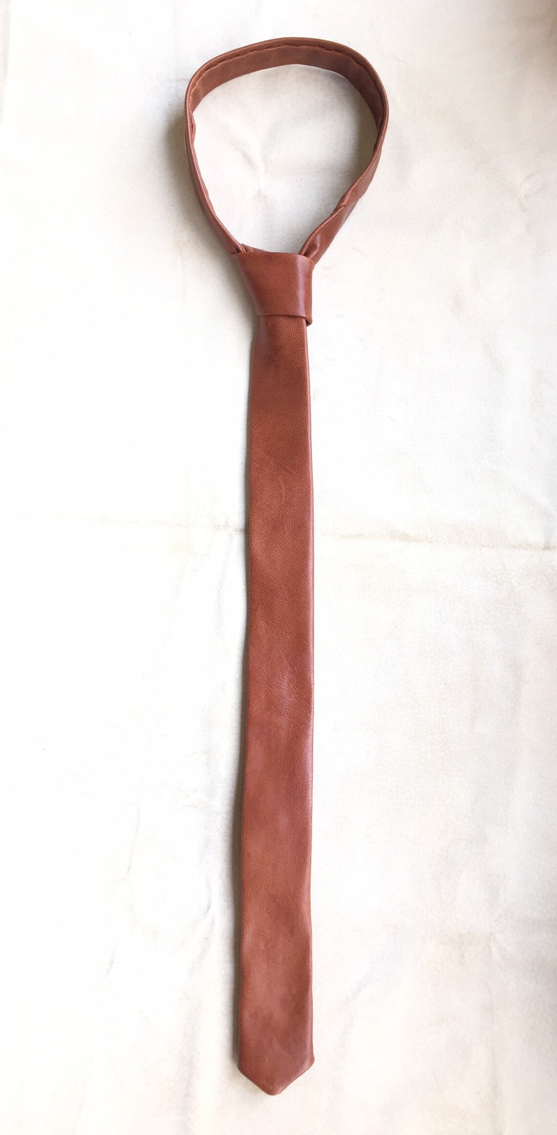 thin leather tie