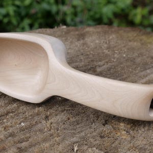 Hand carved Alderwood scoop with leather hanging loop