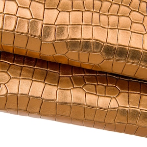 Pelle COCCODRILLO bronzo, capra stampata LAMINATA marrone, pellame metallizzato morbido B17560-MT(st) La Garzarara