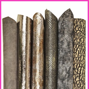 Może przedstawiać: Sześć rolek skóry ekologicznej w różnych fakturach i kolorach, w tym czarny, srebrny i złoty. Rolki są ułożone pionowo.