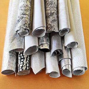 3 Random Skins in White, Silver, Light Gray, Suede & metallic, tone to tone hides SKU B14922-ST La Garzarara