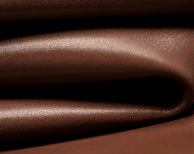 useful for clothing too A568 La Garzarara very lightweight and soft skin Italian leather laminated fabric effect