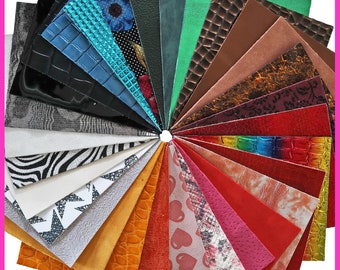 May include: A selection of colourful faux leather sheets with various textures and patterns, including floral, animal print, and geometric designs.