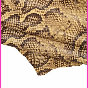 PELLE PITONE beige e nero, capra disegno rettile semi lucida, pellame motivo serpente, morbidezza media B16044-ST La Garzarara