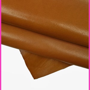 PELLE color cognac morbida, vitello marrone chiaro con grana piccola leggera, pellame nappato lucido setoso B14756-TU