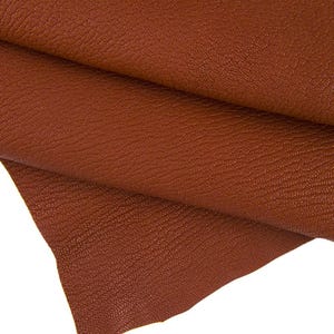Pellame marrone rossiccio con GRANA piccola, capra color mattone sportiva, pellame morbido spessorato 1.8 - 2.0 mm B16674-TU La Garzarara