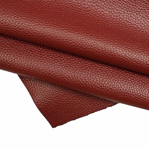 Pelle dollaro rosso rubino, pelle bordeaux chiaro stampa martellata sportiva, pellame con grana morbido 1.3-1.5 mm B16118-TU La Garzarara