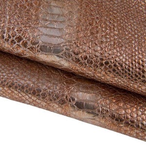 Pelle stampa RETTILE bronzo, capra LAMINATA motivo serpente pitone, pellame morbido metallizzato B17328-MT(st) La Garzarara