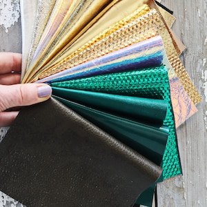 Ritagli di pelle PLATINO ORO e VERDE, selezione casuale, scampoli laminati e non, tinta unita, lisci,grana e morbidezze varie  300 gr  B1520