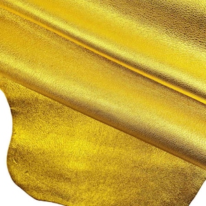 Pellami laminati colori accesi giallo salmone turchese bluette, pelli morbide metallizzate su capra con grana B13557-MT  La Garzarara