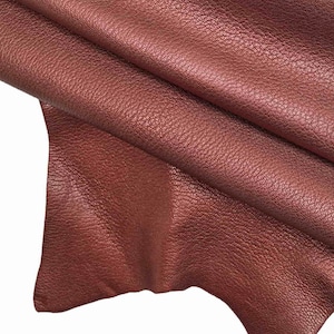 Pelle con grana martellata metallizzata ruggine/bordeaux, pellame di capra aspetto satinato raffinato B13437-MT(st) La Garzarara