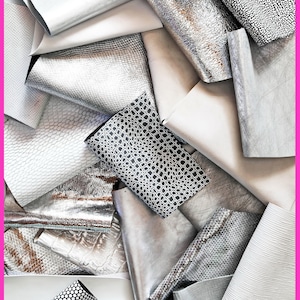 Sacchetto di ritagli di pelle miste, tonalità di BIANCO, GRIGIO e ARGENTO, stampe, fantasie e morbidezze varie - da 0,300 kg a 1 kg -  B056