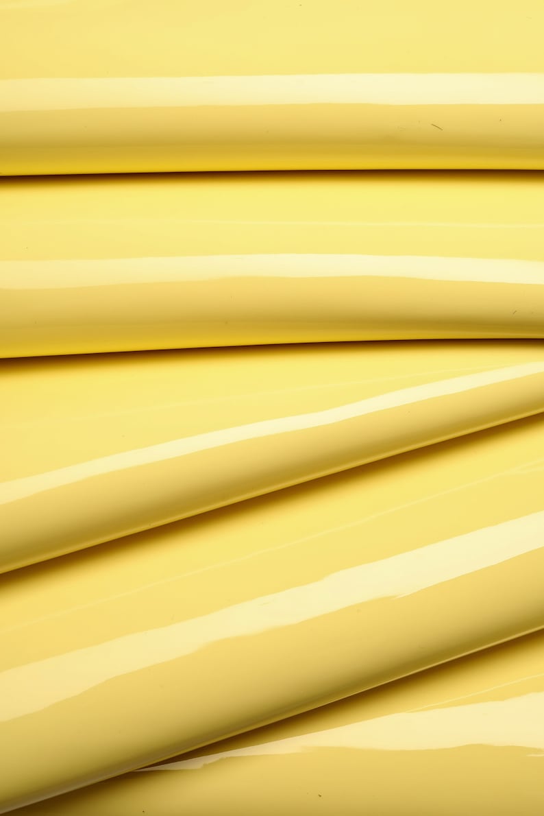 smooth pastel yellow patent hides size 27x31 inches slightly stiff skin A6699-TU La Garzarara Italian leather thickness 0.80.9 mm