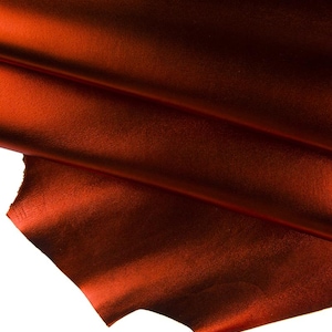 PELLAME metallizzato RUGGINE, capra laminata rosso scuro, pelle lucida morbida, 0.7 - 0.9 mm ideale per il fai da te B16740-MT La Garzarara