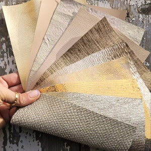10 Ritagli di pellami unici selezionati, stampati sui toni ORO, PLATINO e BEIGE, pezzi mix di fantasie come da foto RT214    La Garzarara