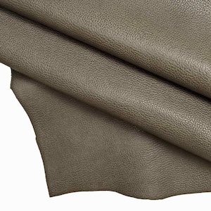 Pelle italiana, pellame vitello grigio ardesia con grana stampata dollaro, lucido, abbastanza morbido, look sportivo B13243-VT La Garzarara