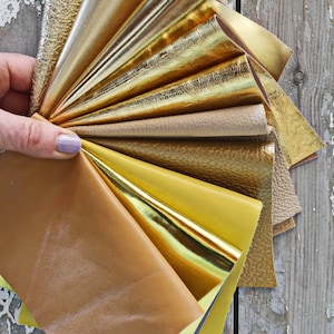 10 Ritagli di pelle Oro, Giallo e Beige, scampoli laminati e NON, tinta unita, lisci, con grana, spessori e morbidezze varie  B1531