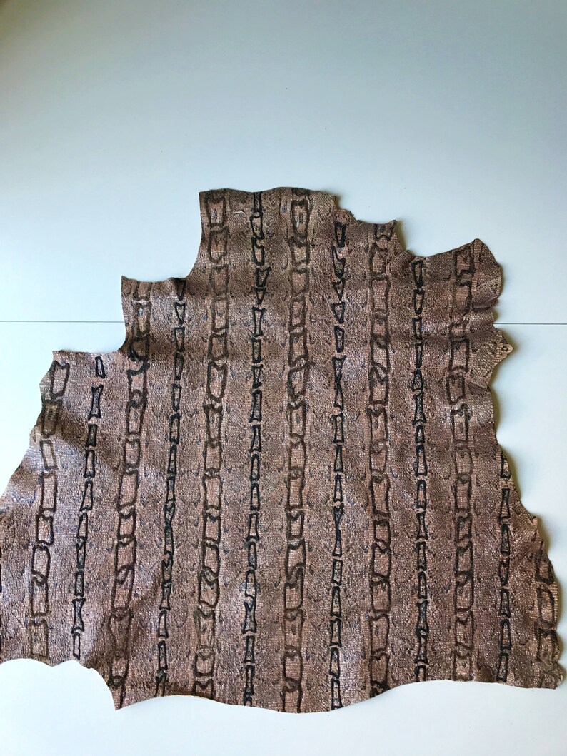 Printed luxury leather skin decorated with glitter and glass beads A671 La Garzarara