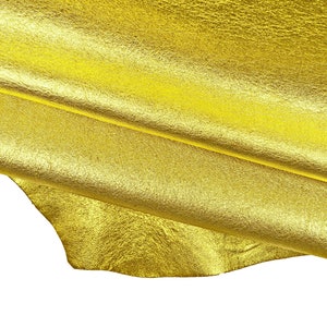 Pellame laminato GIALLO, pelle metallizzata gialla, capra morbida luminosa leggermente stropicciata 15324-MT La Garzarara