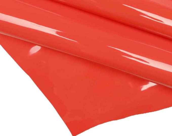 Shiny bright leather hides Laquered LEATHER hides, laquered coral red, acid green and plum purple skins, patent goat B14105-TU La Garzarara