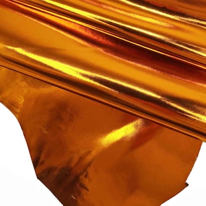 PELLE specchio laminato  colori brillanti - pellame lucidissimo liscio, metallizzato fuxia giallo arancio  B11757-MT La Garzarara
