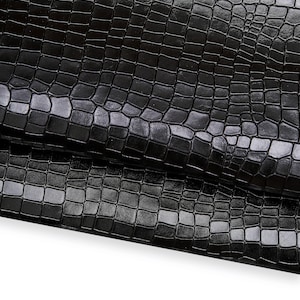 Pellame COCCODRILLO nero lucido su fondo testa di moro, vitello stampato morbido 0.9-1.1 mm B17789-TB   La Garzarara