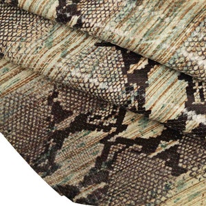 PELLE PITONE stampato, pellame con disegno serpente righe e livrea nera, vitello rettile fantasia multicolor B13288-ST La Garzarara