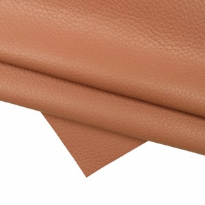 Pelle di vitello stampata dollaro colore rosa scuro, pellame morbido con grana martellata semi lucido B15021-TU La Garzarara