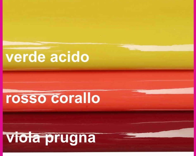 Shiny bright leather hides Laquered LEATHER hides, laquered coral red, acid green and plum purple skins, patent goat B14105-TU La Garzarara