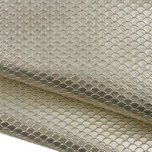 May include: A metallic gold material featuring a repeating embossed scale pattern. The surface has a reflective sheen and a textured finish with small, uniform, semi-circular shapes arranged in a consistent, overlapping grid across the entire piece.