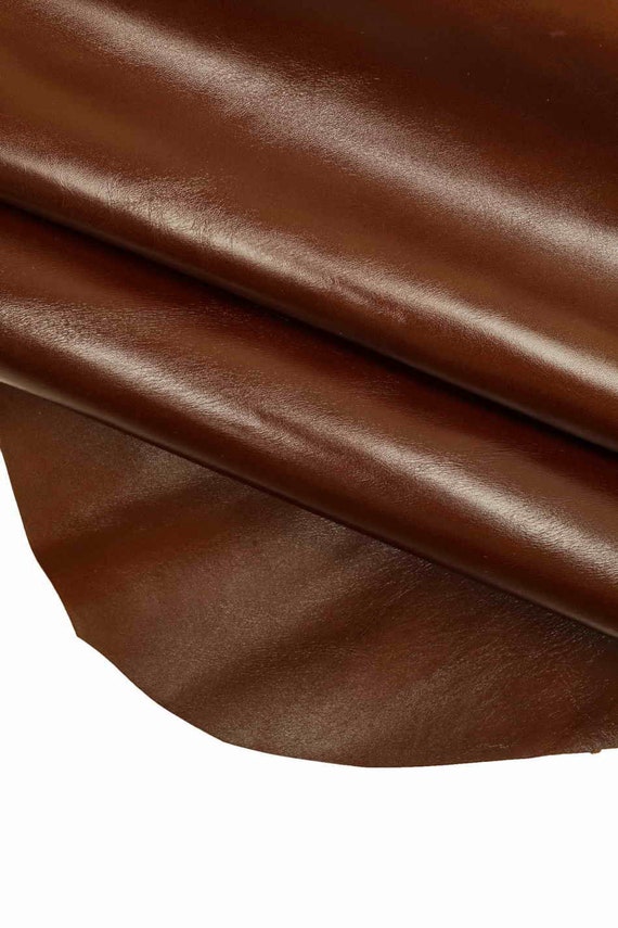 Italian Cowhide leather skin Cow hide Shiny Dark Brown 8" x 10" Inches 3 oz. Italian Cowhide leather skin Cow hide Shiny Dark Brown 8" x 10" Inches 3 oz.