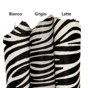Pelle cavallino ZEBRATO, pellame vitello pony bianco-grigio-latte stampa animalier nera B17921-CV   La Garzarara