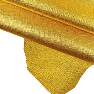 PELLAME LAMINATO turchese, viola, giallo, lilla, fucsia, pelle di capra metallizzata con grana stampata effetto onda B14164-MT La Garzarara