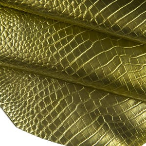 Pellame LAMINATO oro stampa coccodrillo, vitello metallizzato motivo COCCO, vitello lucido 1.0 - 1.2 mm B16657-MT(st)  La Garzarara