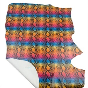 May include: A set of three ceramic canisters with lids, featuring a geometric pattern in shades of blue, white, and gray. The canisters vary in size, suitable for kitchen storage.