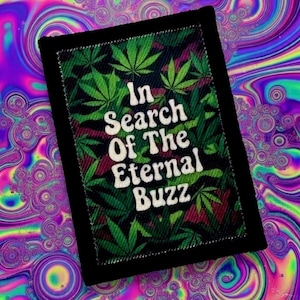 May include: A black rectangular patch with the text "In Search Of The Eternal Buzz" in white. The patch features a green cannabis leaf pattern on a dark background. The background is a psychedelic swirl of colors.