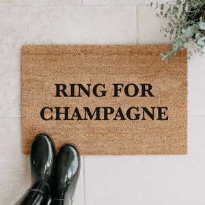 Felpudo de coco 'Ring For Champagne' | Regalo de inauguración de la alfombra interior | felpudo divertido | Felpudo
