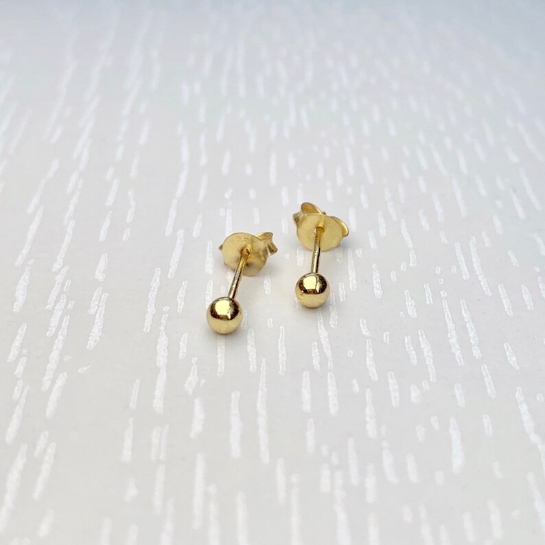 small gold ear studs