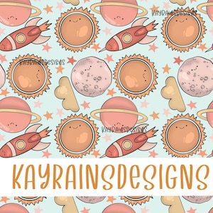 May include: A seamless pattern featuring a light blue background with various space-themed illustrations. The pattern includes suns, planets, rockets, and stars. The suns and planets have smiling faces. The rockets are red with white accents. The stars are yellow. The text "KAYRAINS DESIGNS" is displayed in orange at the bottom of the pattern.