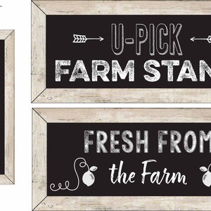May include: Two black chalkboard signs with white text and a wood frame. The top sign says "U-PICK FARM STAND" with arrows pointing to the text. The bottom sign says "FRESH FROM the Farm" with a lemon illustration.