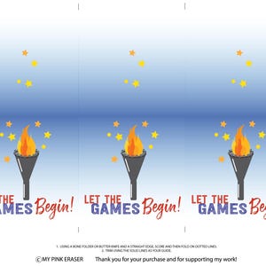 Puede incluir: Una hoja imprimible con tres ilustraciones de antorchas ol&iacute;mpicas con llamas y estrellas. El texto "LET THE GAMES Begin!" se muestra debajo de cada antorcha. El fondo es un degradado de azul.