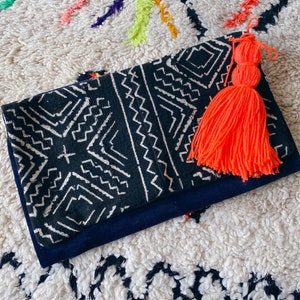 Mud cloth clutch bag with tassel