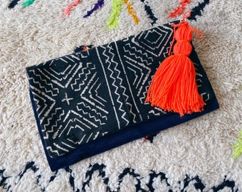 Mud cloth clutch bag with tassel