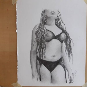Original 8.5x11 inch pencil drawing of exotic woman done by ARTuro