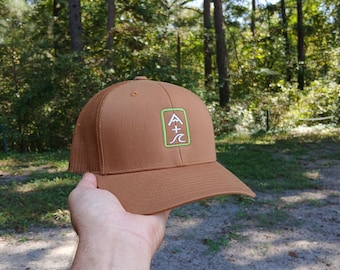 Mountain & Wave Hat (tan/tan mesh, vertical green logo)