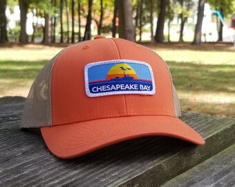 Chesapeake Bay Deadrise Patch Trucker Hat (orange)