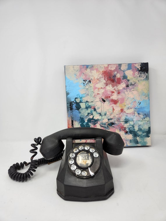 Téléphone vintage mural en bakélite