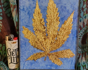 Framed gilded Cannabis/Hemp leaf Faux Gold Leafing Gold leaf on Blue fabric