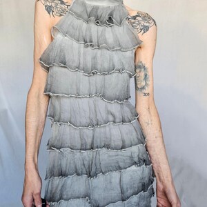 a woman with a tattoo on her arm
