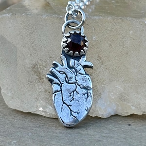Sterling silver anatomical heart pendant with garnet, witchy jewelry